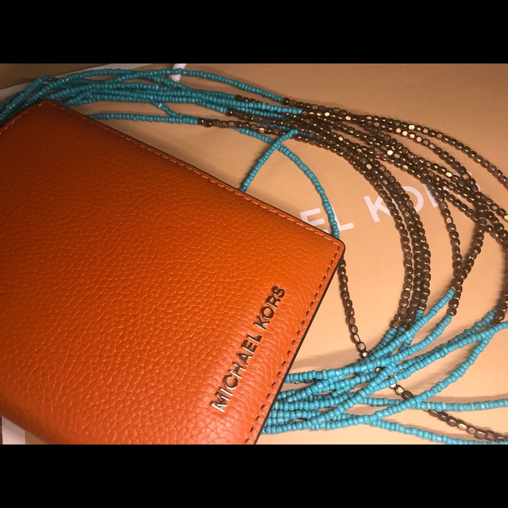 Michael Kors Orange Passport Holder with I.D Face